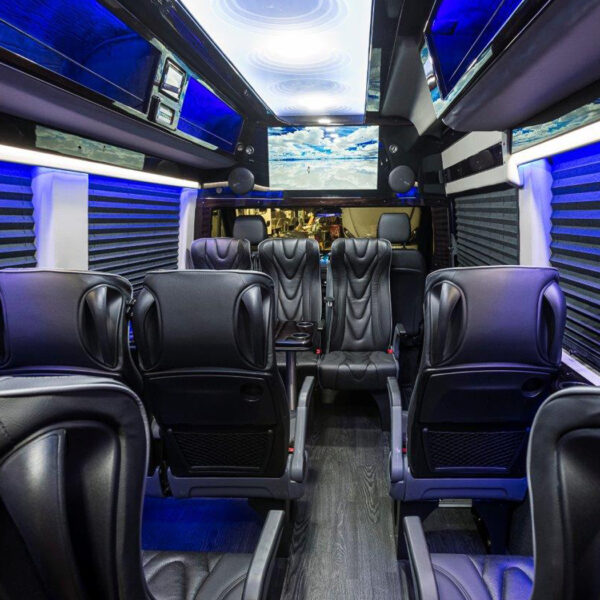 interior view of executive coach sprinter shuttle showing the front end of the vehicle