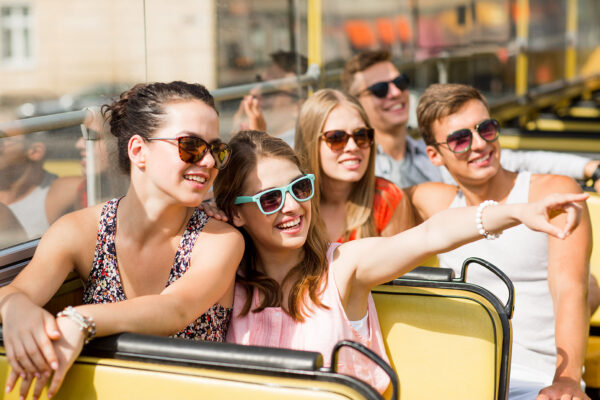Group enjoying tour on coach bus