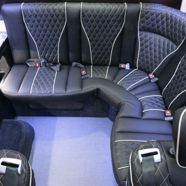 Curved seating in luxury vehicles at CoachWest Curved seating in luxury vehicles at CoachWest