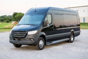 Side angled view of a 2022 Mercedes Sprinter Van—the Benz Executive Coach CEO Sprinter Diplomat