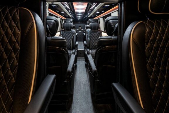 Luxury seating inside a 2022 Mercedes Benz Executive Coach CEO Sprinter Diplomat