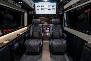 Black leather seats and TV inside 2022 Mercedes Benz Executive Coach CEO Sprinter Diplomat