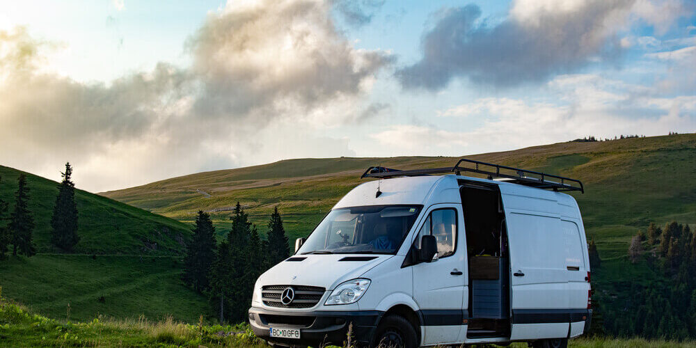 mercedes sprinter van parked in field