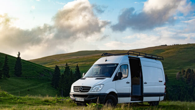 mercedes sprinter van parked in field