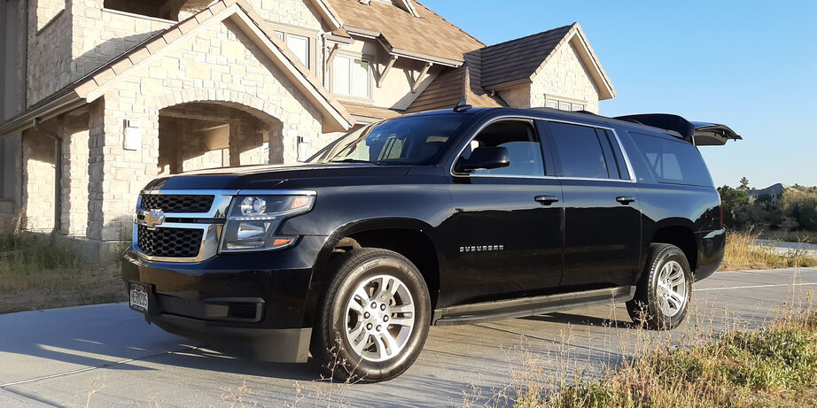 SUV limousine parked in a driveway
