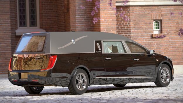 Cadillac funeral hearse with extended roofline and chrome trim parked outside a brick building Cadillac funeral hearse with extended roofline and chrome trim parked outside a brick building