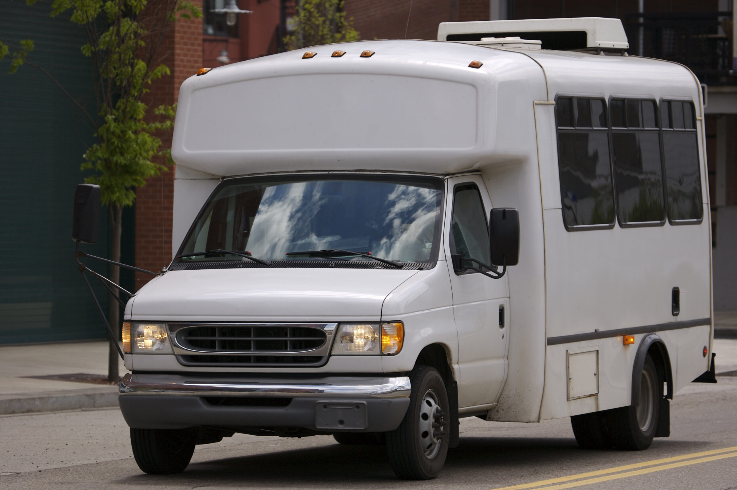 white shuttle bus