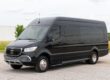 Exterior view of black Sprinter van